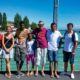Geflüchtete und ehrenamtliche Vertreter von Save me Konstanz e.V. im Sommer 2015 auf der Fahrradbrücke bei einer von Save me angebotenen Stadtführung